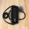 black handbag top view with zipper compartments and shoulder strap stylish tote bag