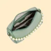 Top view of mint green pearl sling bag with spacious zip compartment and inner pockets for women