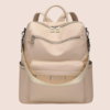 Elegant beige women’s leather backpack purse with zip compartments and adjustable straps