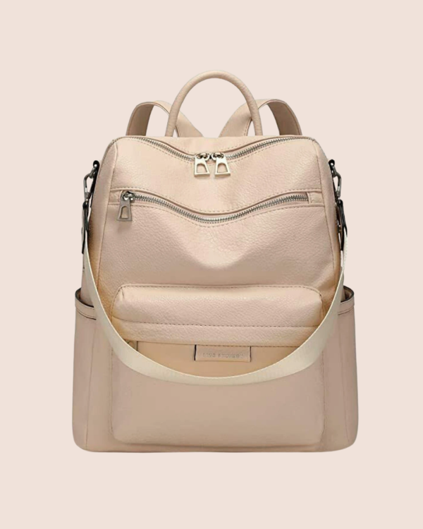 Elegant beige women’s leather backpack purse with zip compartments and adjustable straps