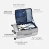 Open travel trolley suitcase with mesh pocket, wet pouch, compression straps, and spacious storage compartments
