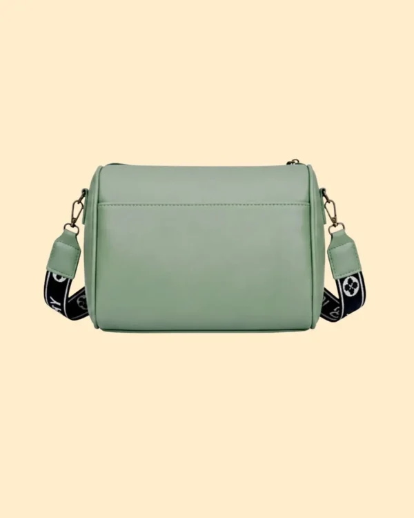 Stylish mint green women’s sling bag with pearl chain detailing, spacious inner compartments, secure zipper closure, and organized storage pockets. Perfect trendy crossbody handbag for daily use and travel.