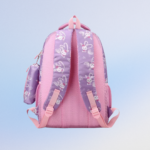 Back view of purple kids backpack with padded straps and bunny print design