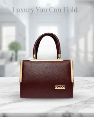 Luxury maroon leather handbag for women with gold detailing and elegant top handle design