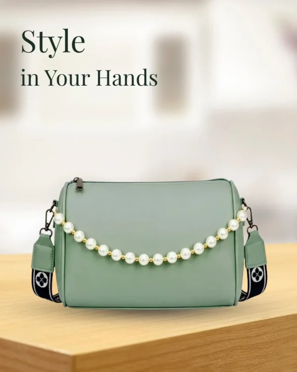 Stylish mint green pearl sling bag for women with adjustable strap and elegant design