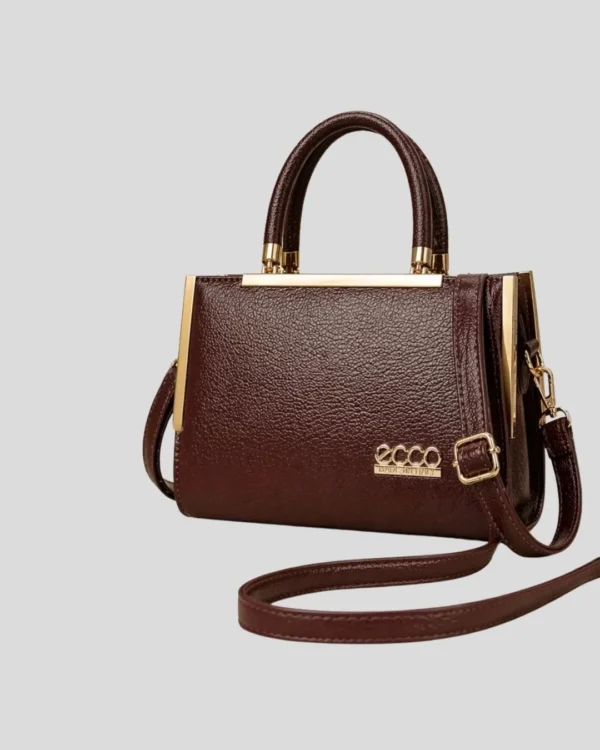 Luxury brown women handbag with gold detailing and adjustable shoulder strap